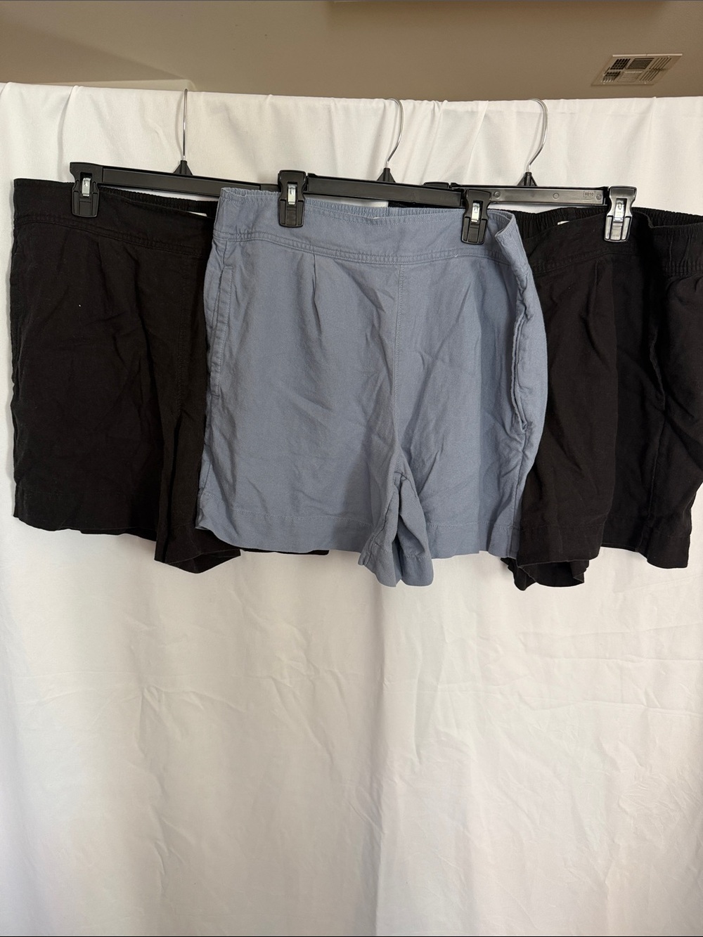 3 pairs Free Assembly linen blend shorts. Two black and 1 periwinkle blue. Large